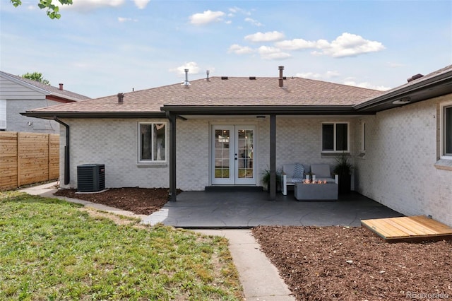 3440 N Harrison St, Denver, CO 80205 - back of house featuring french doors, a patio, roof with shingles, and brick siding