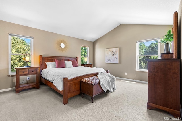 6858 Otis Ct, Arvada, CO 80003 - carpeted bedroom with multiple windows and vaulted ceiling