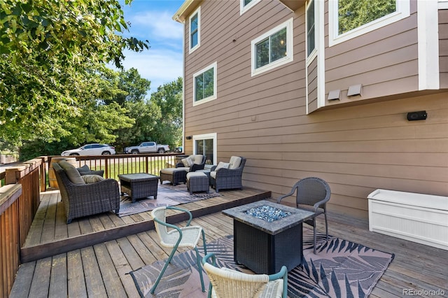 6858 Otis Ct, Arvada, CO 80003 - wooden terrace featuring an outdoor living space with a fire pit