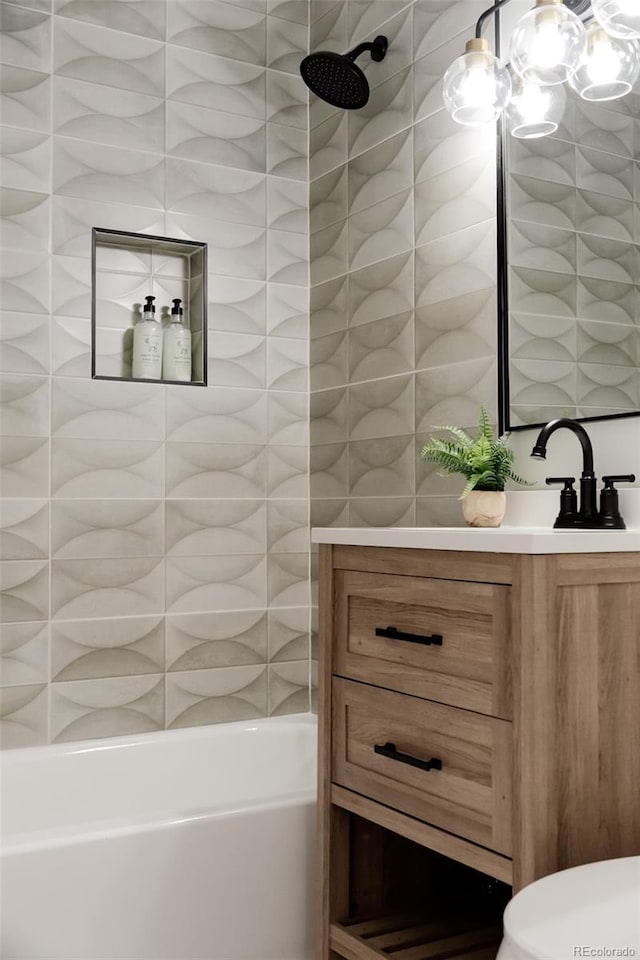 full bathroom with vanity, a shower, and a tub to relax in