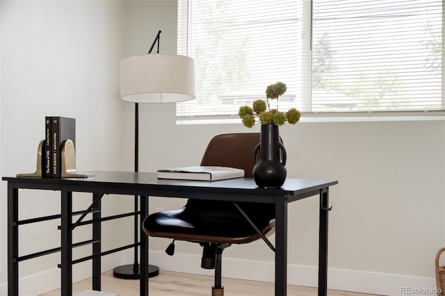 home office featuring wood finished floors
