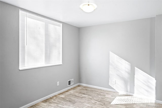 empty room featuring light wood-type flooring