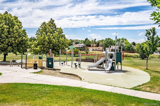 view of playground with a yard