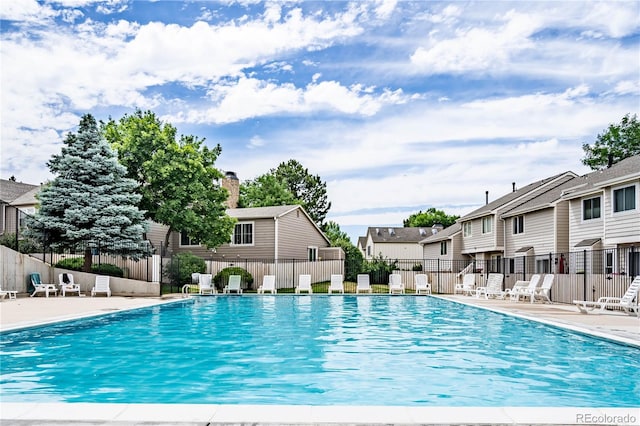 view of swimming pool with a patio area