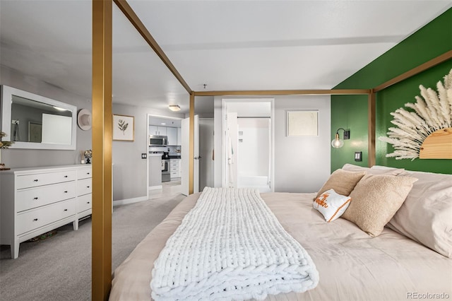 bedroom featuring light colored carpet