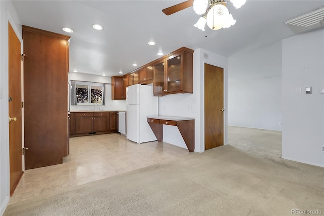 3022 Blackhawk St, Aurora, CO 80011 - kitchen featuring visible vents, a sink, glass insert cabinets, recessed lighting, and white appliances