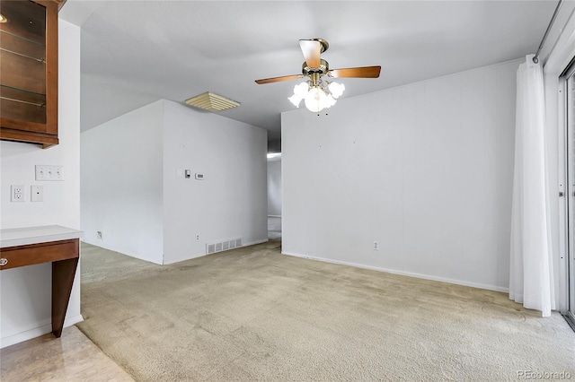3022 Blackhawk St, Aurora, CO 80011 - unfurnished living room featuring visible vents, ceiling fan, and light colored carpet