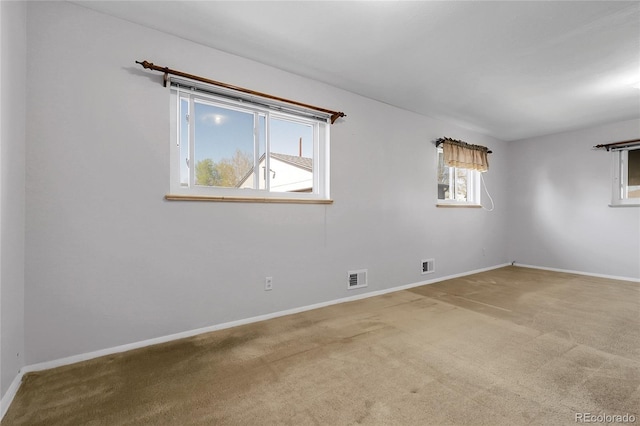 3022 Blackhawk St, Aurora, CO 80011 - empty room featuring baseboards, visible vents, and carpet