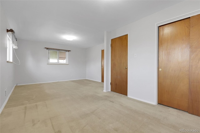 3022 Blackhawk St, Aurora, CO 80011 - interior space with baseboards and light carpet