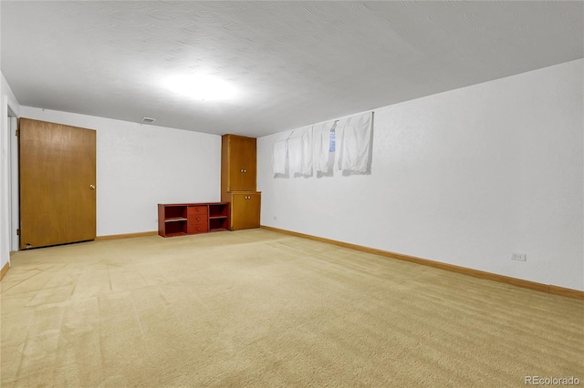 3022 Blackhawk St, Aurora, CO 80011 - interior space with baseboards, visible vents, and light carpet
