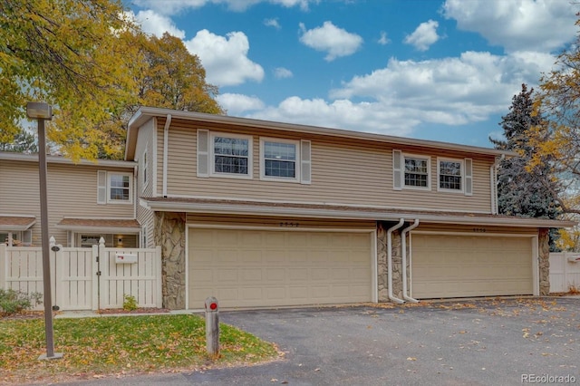 view of front of property featuring a garage