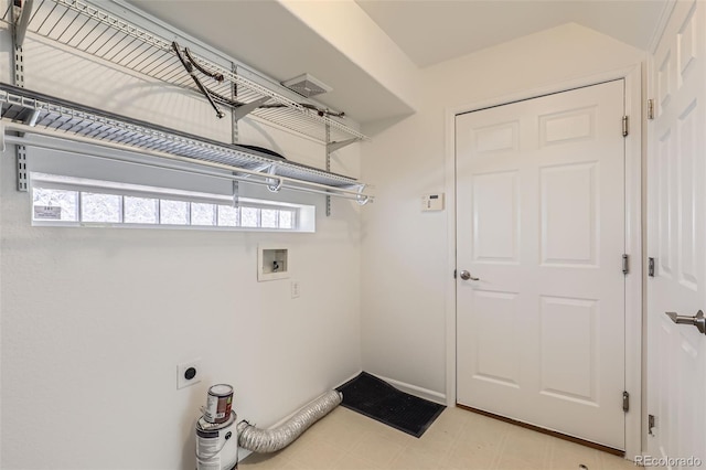 18807 E 51st Pl, Denver, CO 80249 - laundry area featuring plenty of natural light, hookup for an electric dryer, hookup for a washing machine, and light flooring
