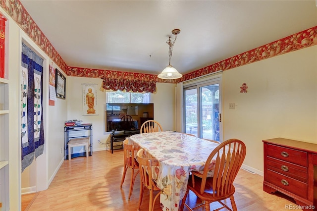 6971 S Valentia St, Centennial, CO 80112 - dining room featuring light wood-style flooring and baseboards