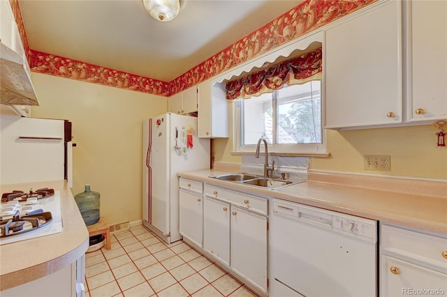 6971 S Valentia St, Centennial, CO 80112 - kitchen featuring white appliances, a sink, light countertops, and white cabinetry