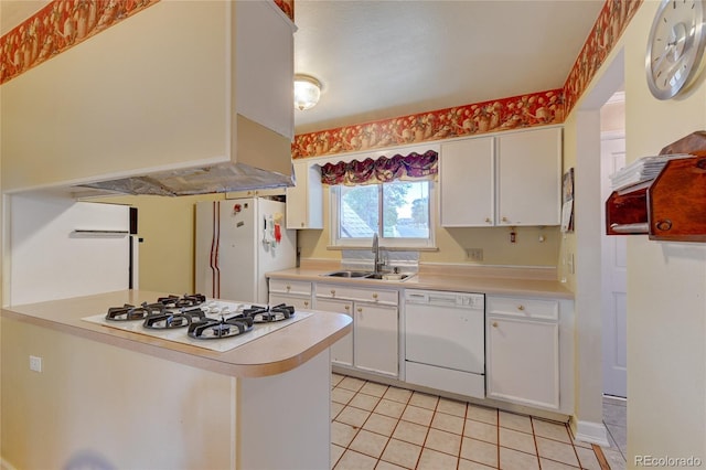 6971 S Valentia St, Centennial, CO 80112 - kitchen featuring white appliances, a sink, light countertops, and white cabinetry