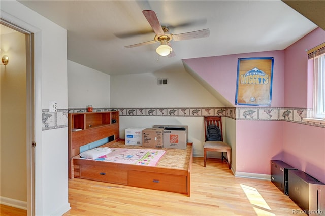 6971 S Valentia St, Centennial, CO 80112 - bedroom with wood finished floors, ceiling fan, and baseboards