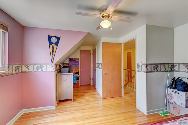 6971 S Valentia St, Centennial, CO 80112 - corridor featuring light wood-type flooring and an upstairs landing