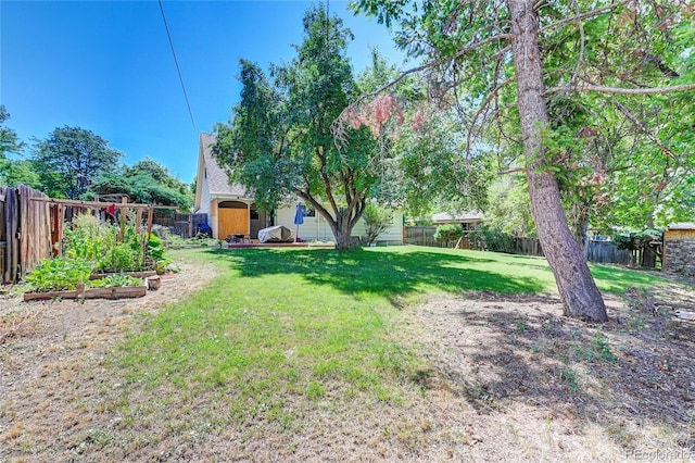 6971 S Valentia St, Centennial, CO 80112 - view of yard with a vegetable garden