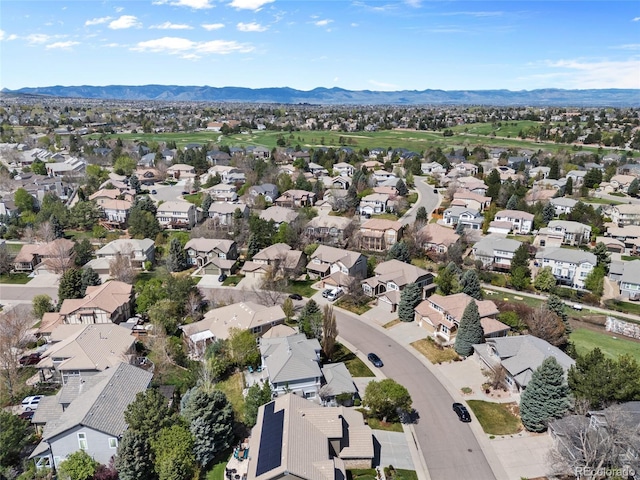 bird's eye view with a residential view and a mountain view