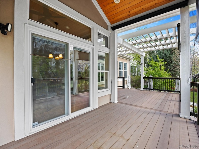 wooden deck featuring a pergola