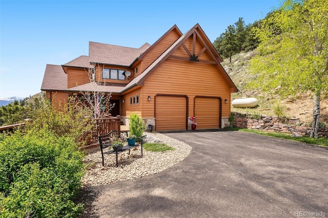 33095 Bergen Mountain Rd, Evergreen, CO 80439 - chalet / cabin with driveway and a shingled roof