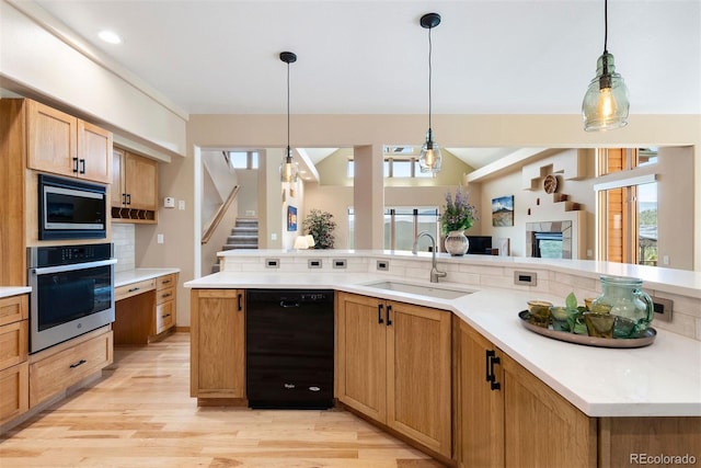 33095 Bergen Mountain Rd, Evergreen, CO 80439 - kitchen featuring oven, dishwasher, a sink, built in microwave, and backsplash