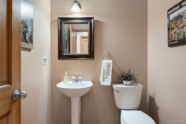 33095 Bergen Mountain Rd, Evergreen, CO 80439 - bathroom featuring toilet and a sink