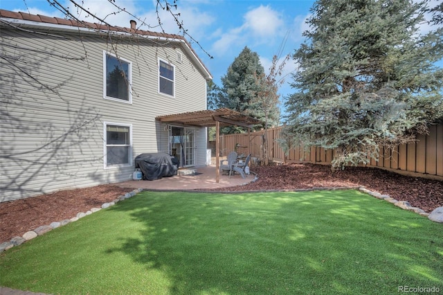 20000 Mitchell Pl Unit 9, Denver, CO 80249 - back of house featuring a lawn, a fenced backyard, and a pergola
