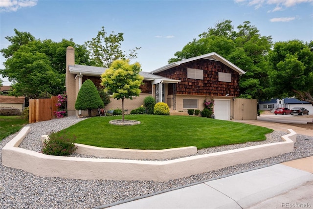 147 Wallace St, Northglenn, CO 80234 - split level home featuring concrete driveway, a garage, and a chimney