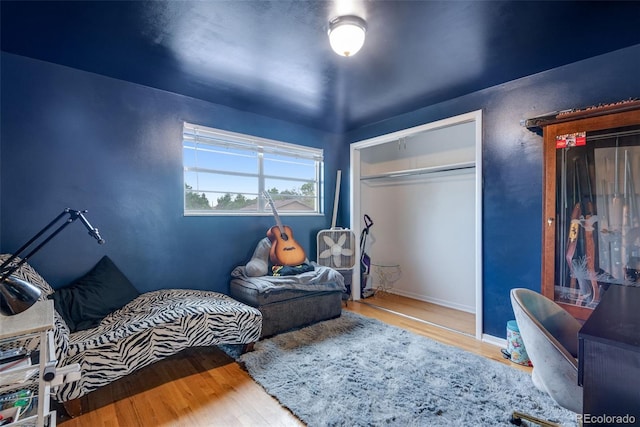 147 Wallace St, Northglenn, CO 80234 - bedroom with wood finished floors and baseboards