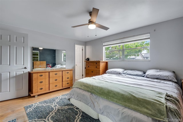 147 Wallace St, Northglenn, CO 80234 - bedroom with light wood-style flooring and a ceiling fan