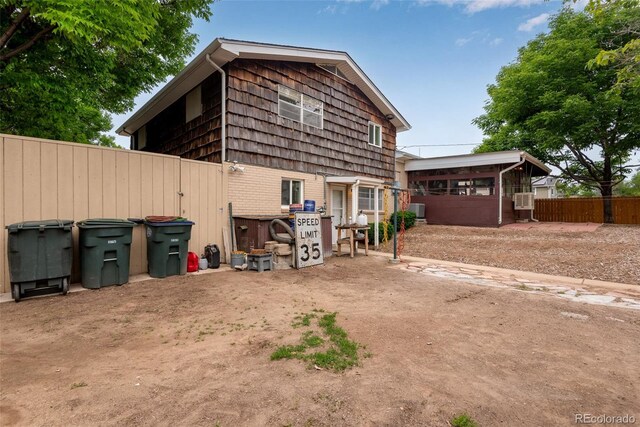 147 Wallace St, Northglenn, CO 80234 - view of front of home featuring central AC and brick siding