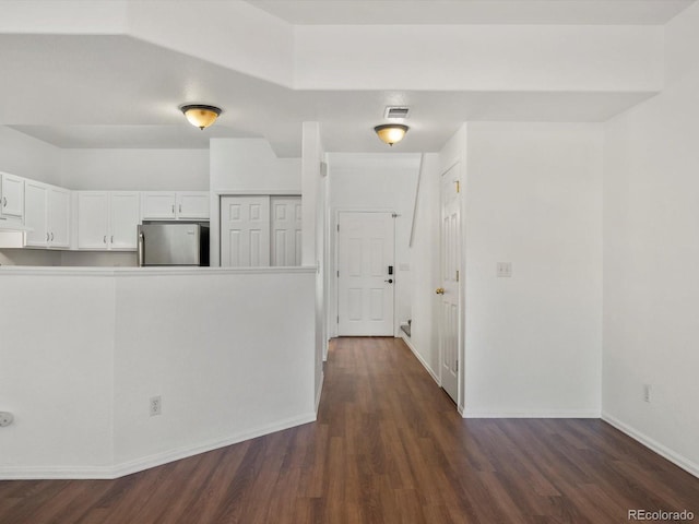 9024 Gale Blvd Unit 3, Thornton, CO 80260 - hallway featuring dark wood-type flooring
