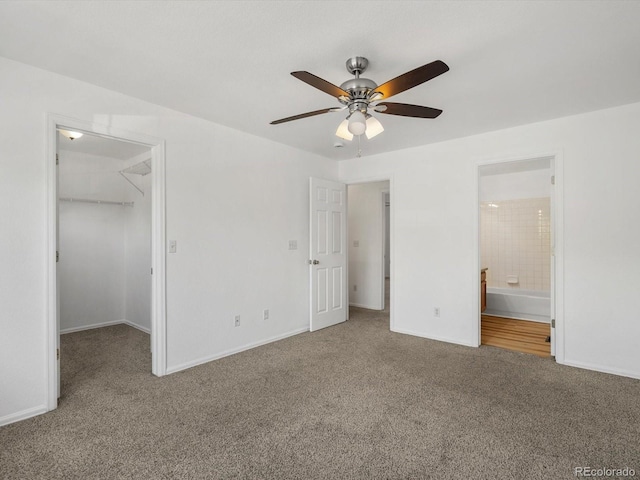 9024 Gale Blvd Unit 3, Thornton, CO 80260 - unfurnished bedroom with carpet, a walk in closet, ensuite bath, and a closet