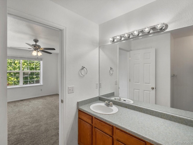 9024 Gale Blvd Unit 3, Thornton, CO 80260 - bathroom featuring vanity and a ceiling fan