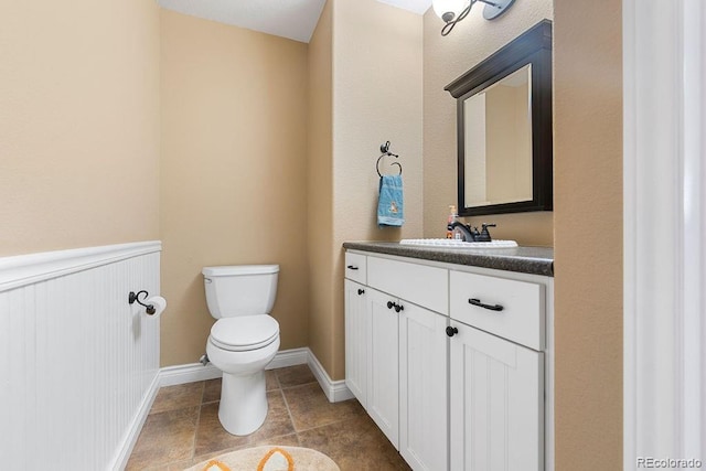 1563 Southpark Rd, Florissant, CO 80816 - half bathroom with vanity and tile patterned flooring