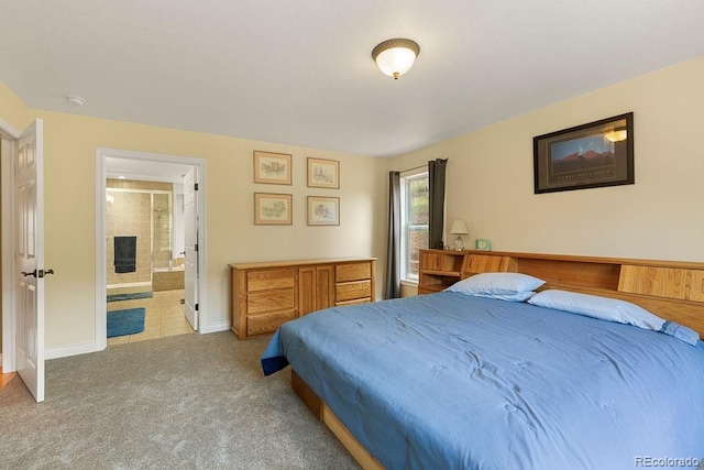 1563 Southpark Rd, Florissant, CO 80816 - carpeted bedroom with baseboards and ensuite bath
