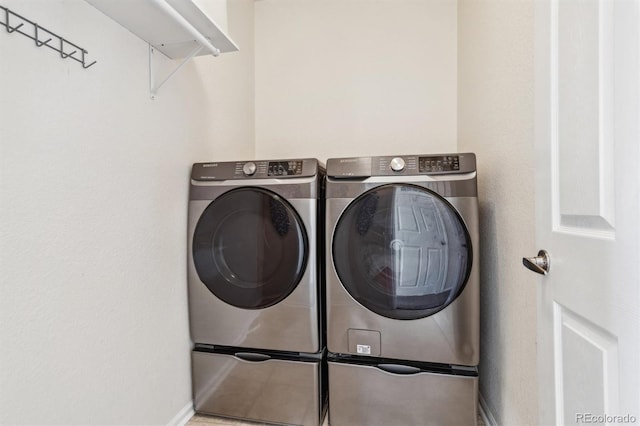 laundry area with washer and dryer