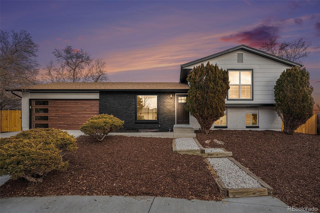 view of front of property featuring a garage