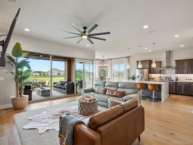2113 Fountain Cir, Erie, CO 80516 - living room with light wood-type flooring, ceiling fan, and recessed lighting