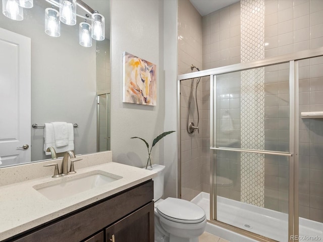 2113 Fountain Cir, Erie, CO 80516 - full bathroom with toilet, a shower stall, and vanity