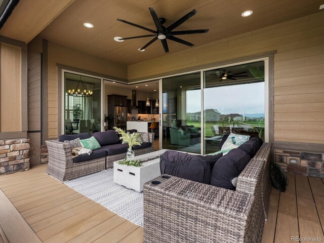 2113 Fountain Cir, Erie, CO 80516 - deck featuring an outdoor living space and a ceiling fan