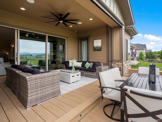 2113 Fountain Cir, Erie, CO 80516 - deck with an outdoor hangout area, a ceiling fan, and outdoor dining space