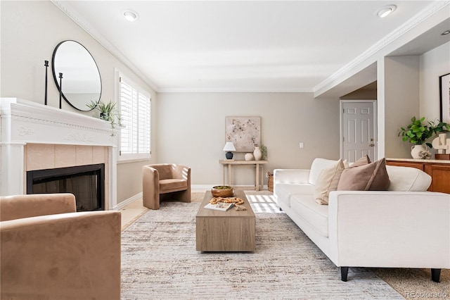 carpeted living room featuring crown molding and a fireplace