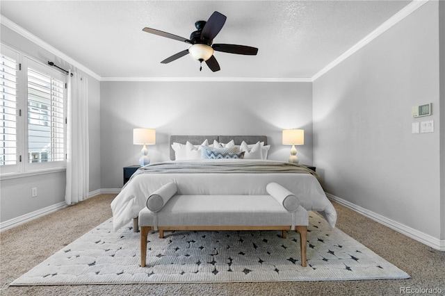 carpeted bedroom featuring a textured ceiling, ceiling fan, and crown molding