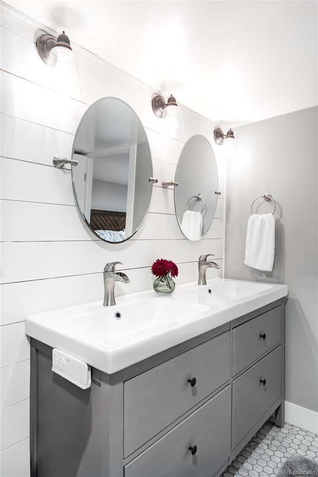 3509 N Monroe St, Denver, CO 80205 - bathroom with double vanity and tile patterned flooring