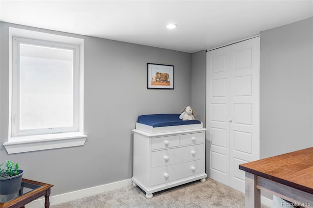 3509 N Monroe St, Denver, CO 80205 - bedroom with light carpet, a closet, and recessed lighting