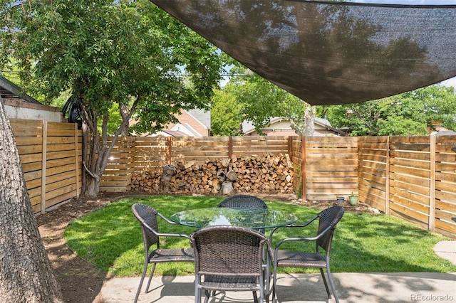 3509 N Monroe St, Denver, CO 80205 - fenced backyard with a patio area and outdoor dining area