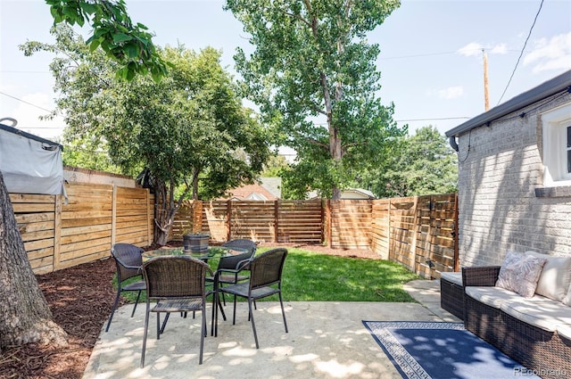 3509 N Monroe St, Denver, CO 80205 - fenced backyard with a patio area and outdoor dining space
