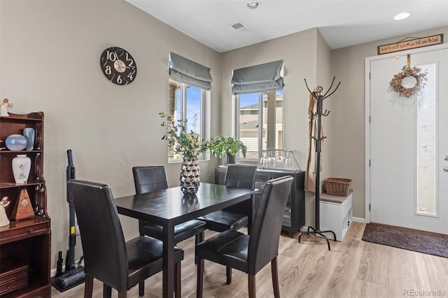 23534 E 5th Pl, Aurora, CO 80018 - dining area with light wood-style flooring and recessed lighting